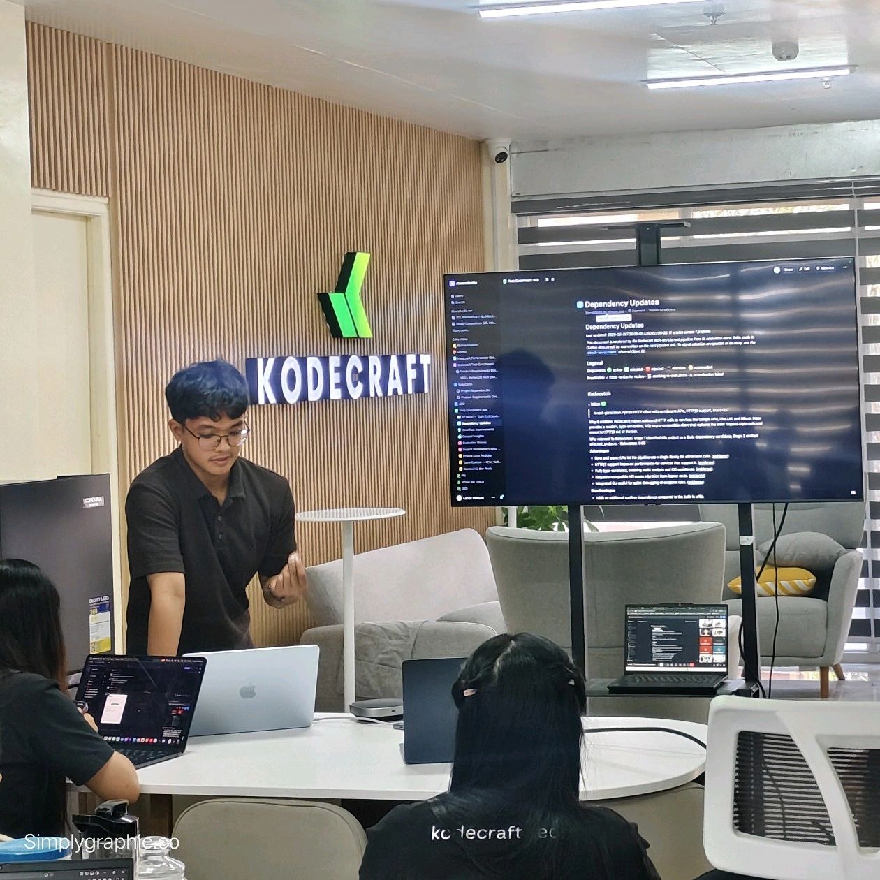 Lance sharing a presentation with the team